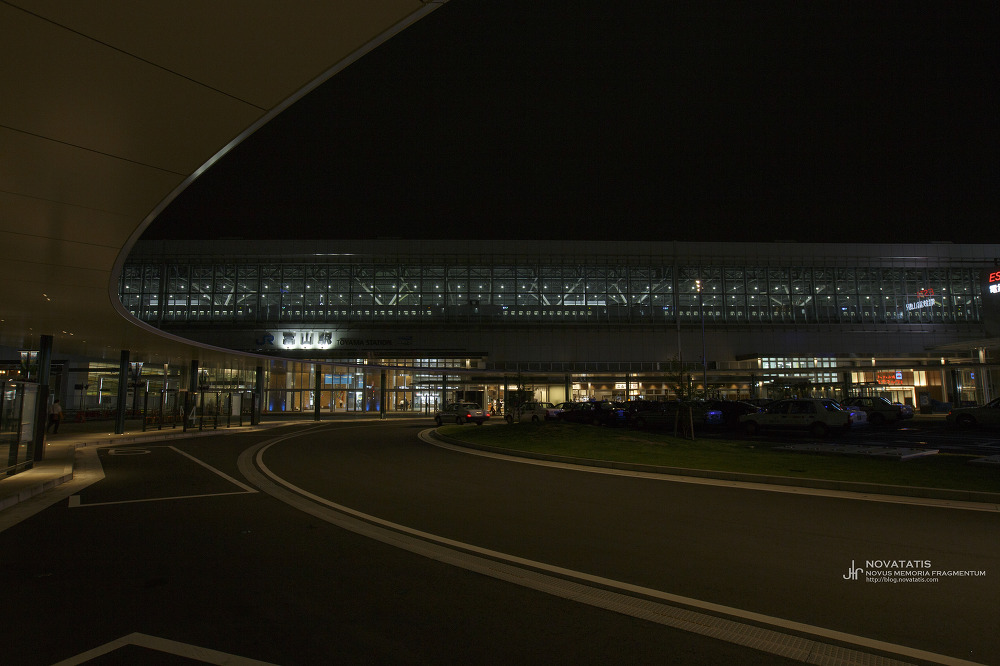 Modern station plaza at night